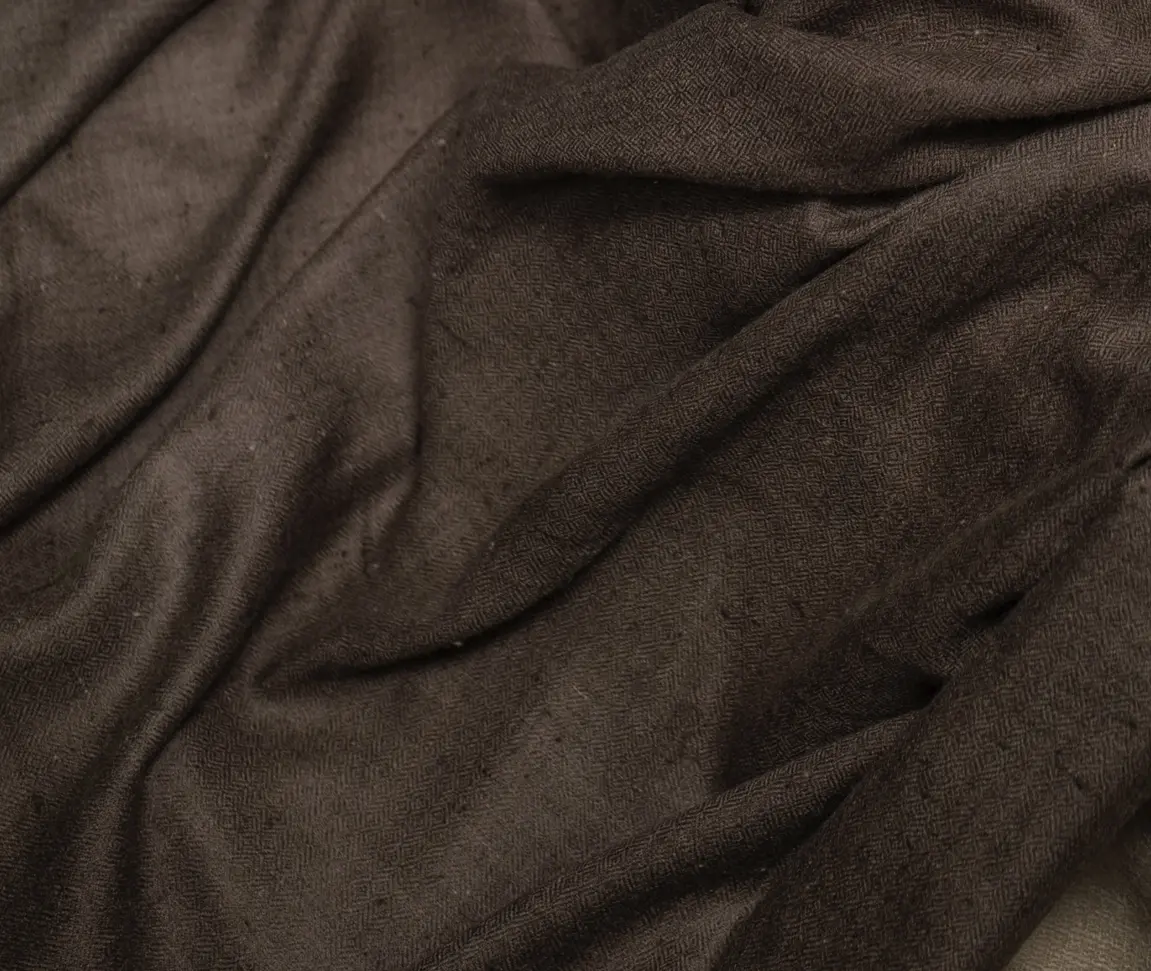Chocolate pashmina fabric arranged in soft folds